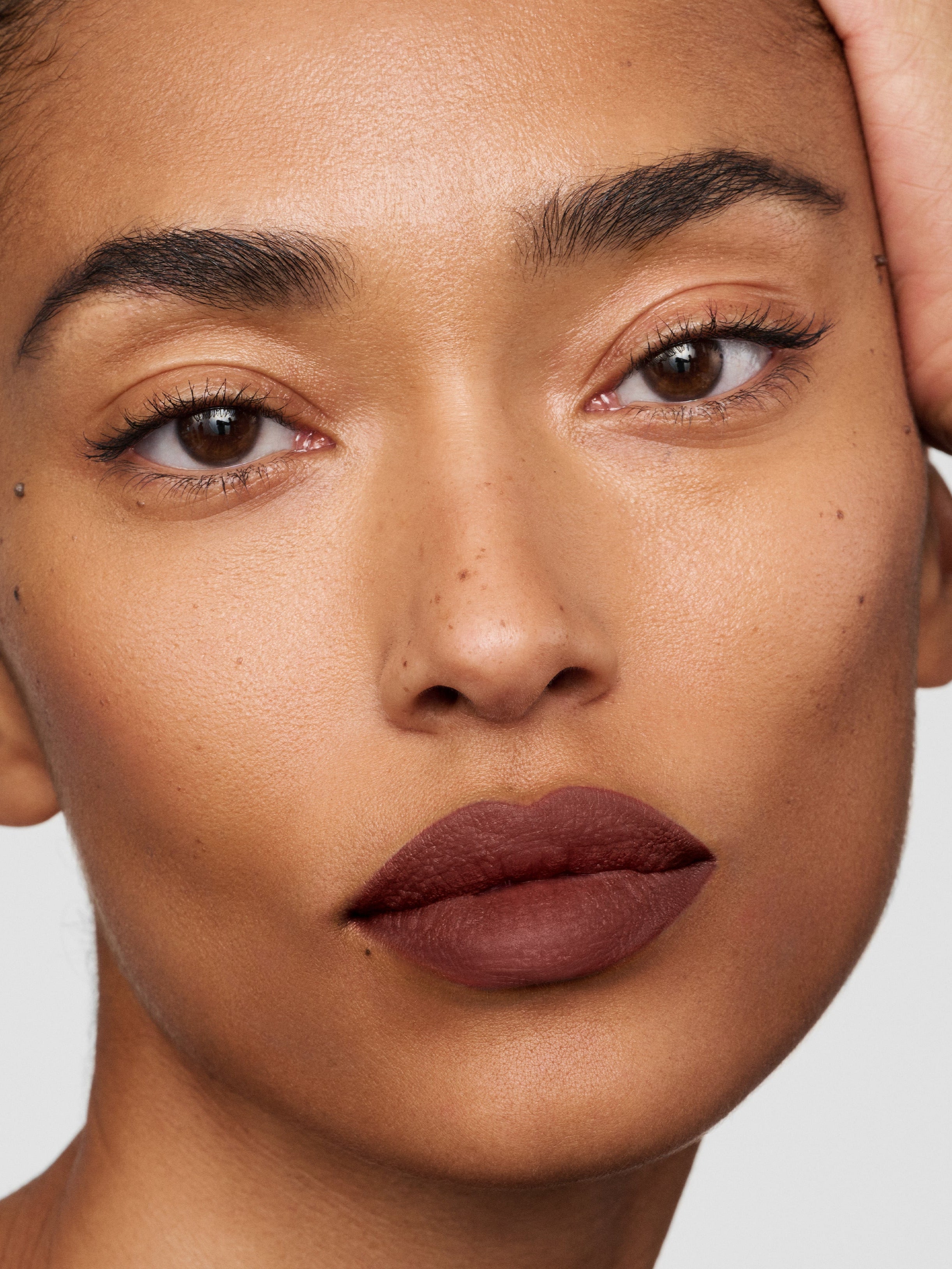 Westman Atelier Lip Suede Matte Lipstick in Rue on lips