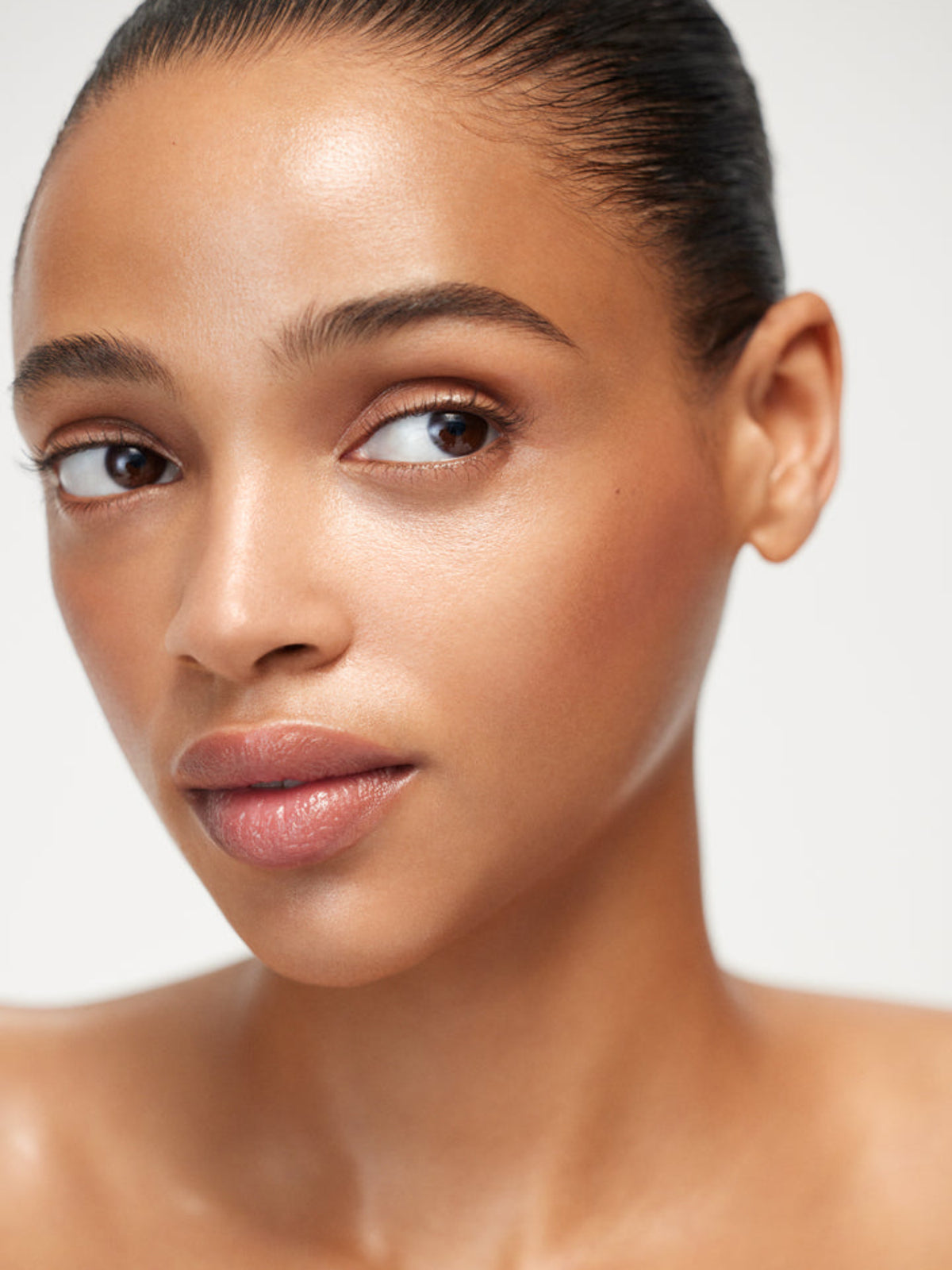 WESTMAN ATELIER Liquid Super Loaded Sheer Illuminator in Peau de Rosé on model
