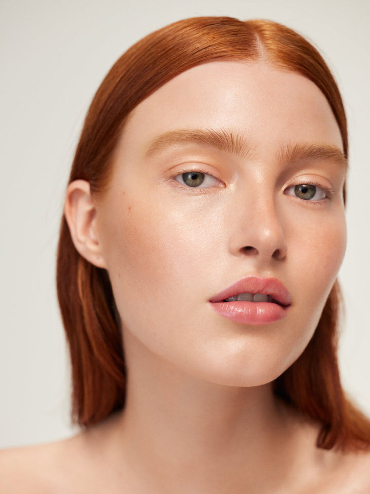WESTMAN ATELIER Liquid Super Loaded Sheer Illuminator in Peau de Soleil on model