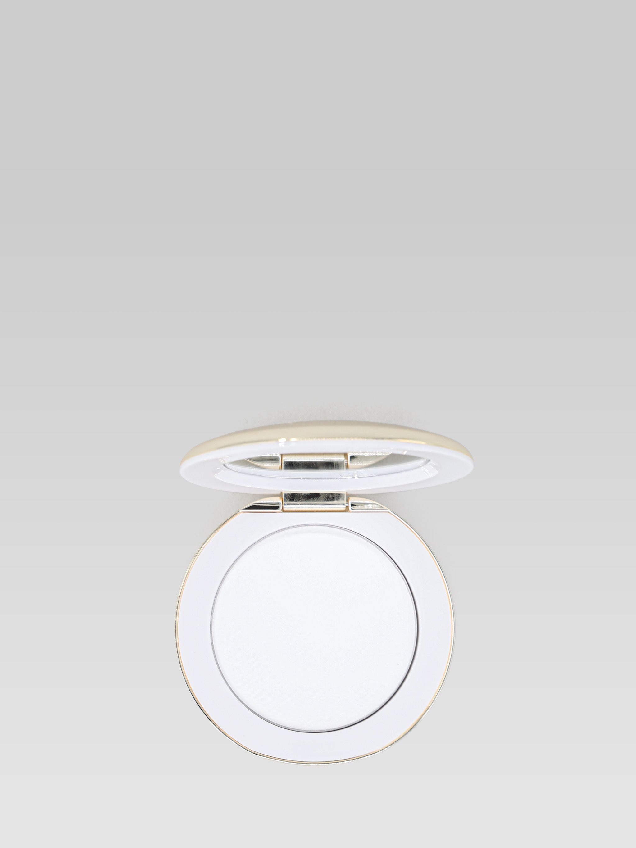 Westman Atelier Vital Pressed Skincare Face Powder in Translucent compact