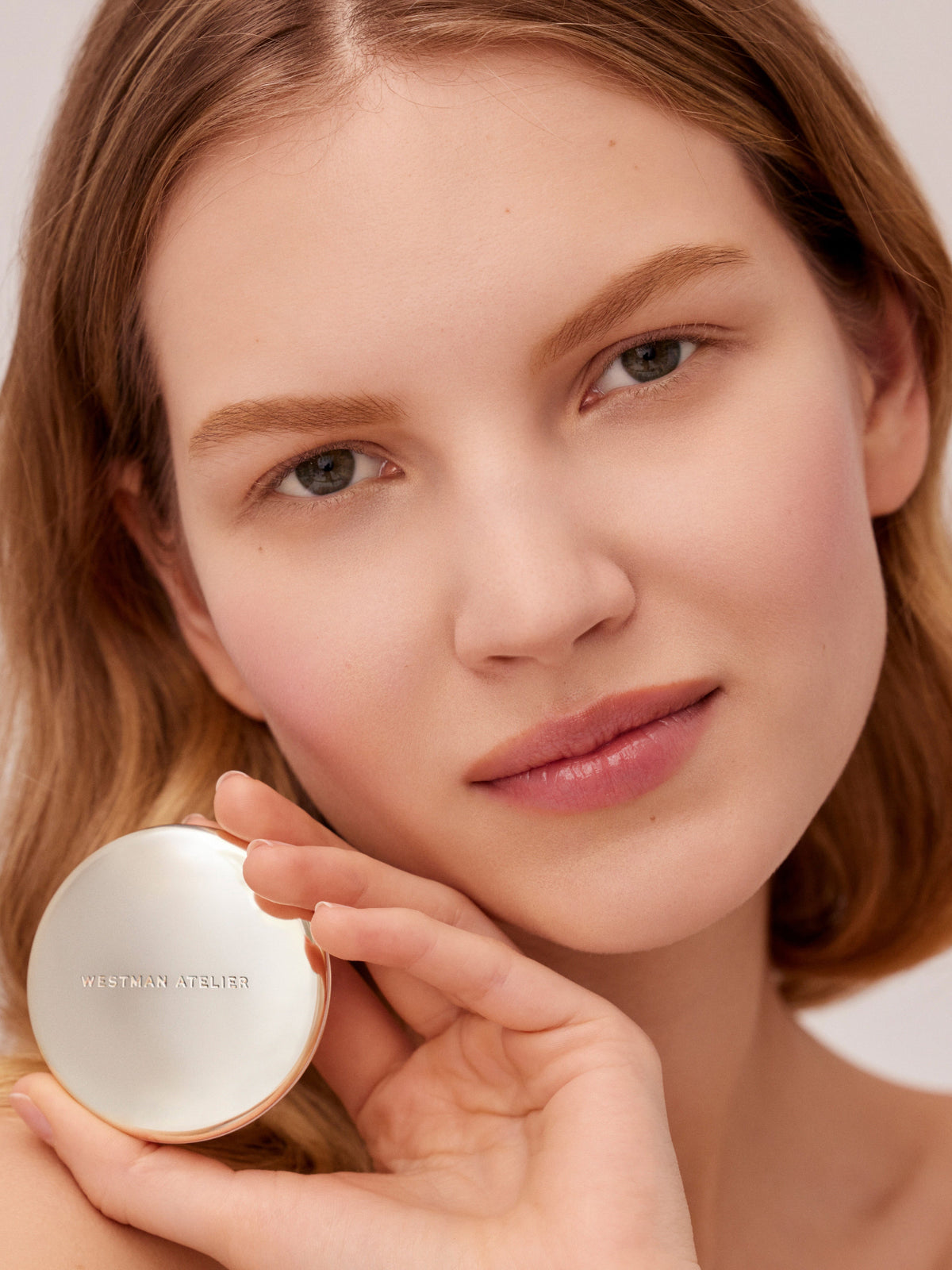 Westman Atelier Vital Pressed Skincare Face Powder in Translucent on model